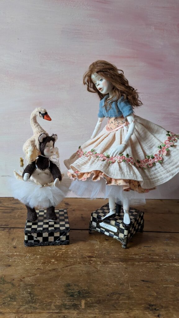 porcelain art doll and teddy with porcelain face